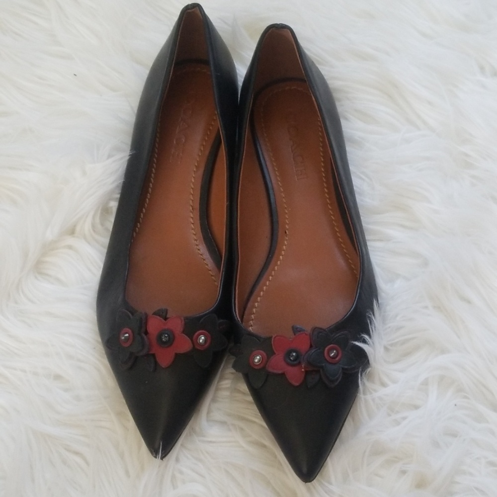 Coach flower flats.
